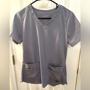 Light grey greys anatomy. Size small. Never worn